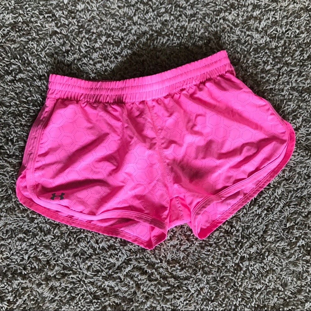 Bright pink under armour shorts.